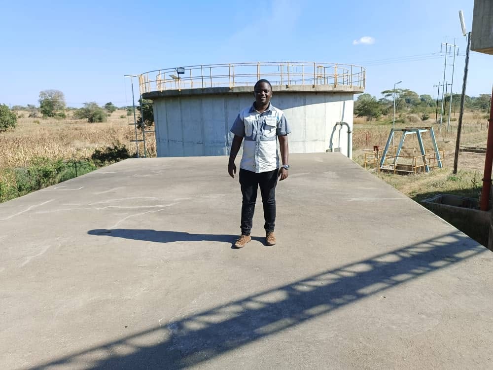 Engineer at a mineral processing plant building during a consultancy project.