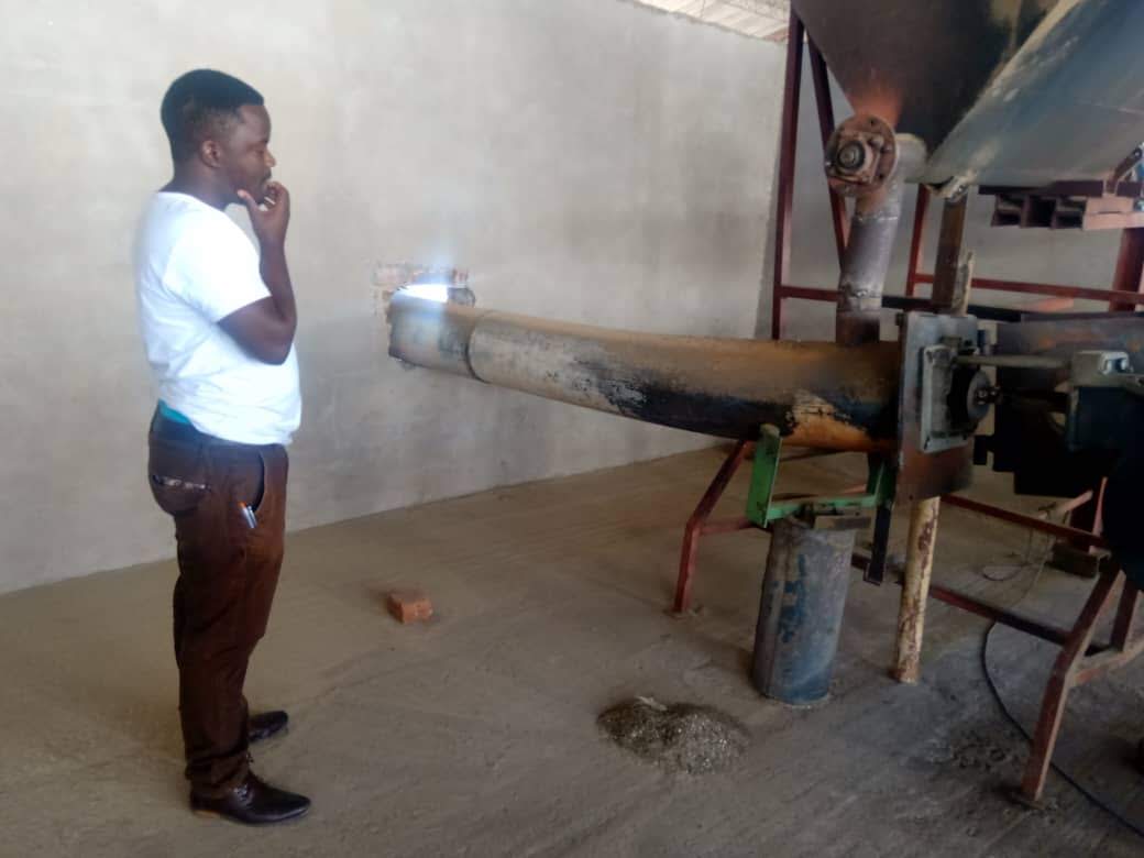 Engineer inspecting plant equipment on a consultancy site visit.