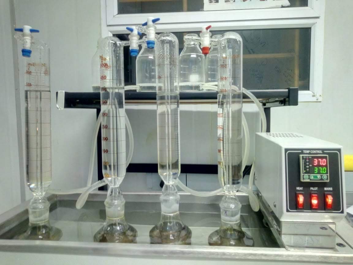 Laboratory-scale glass distillation apparatus used for engineering process testing.