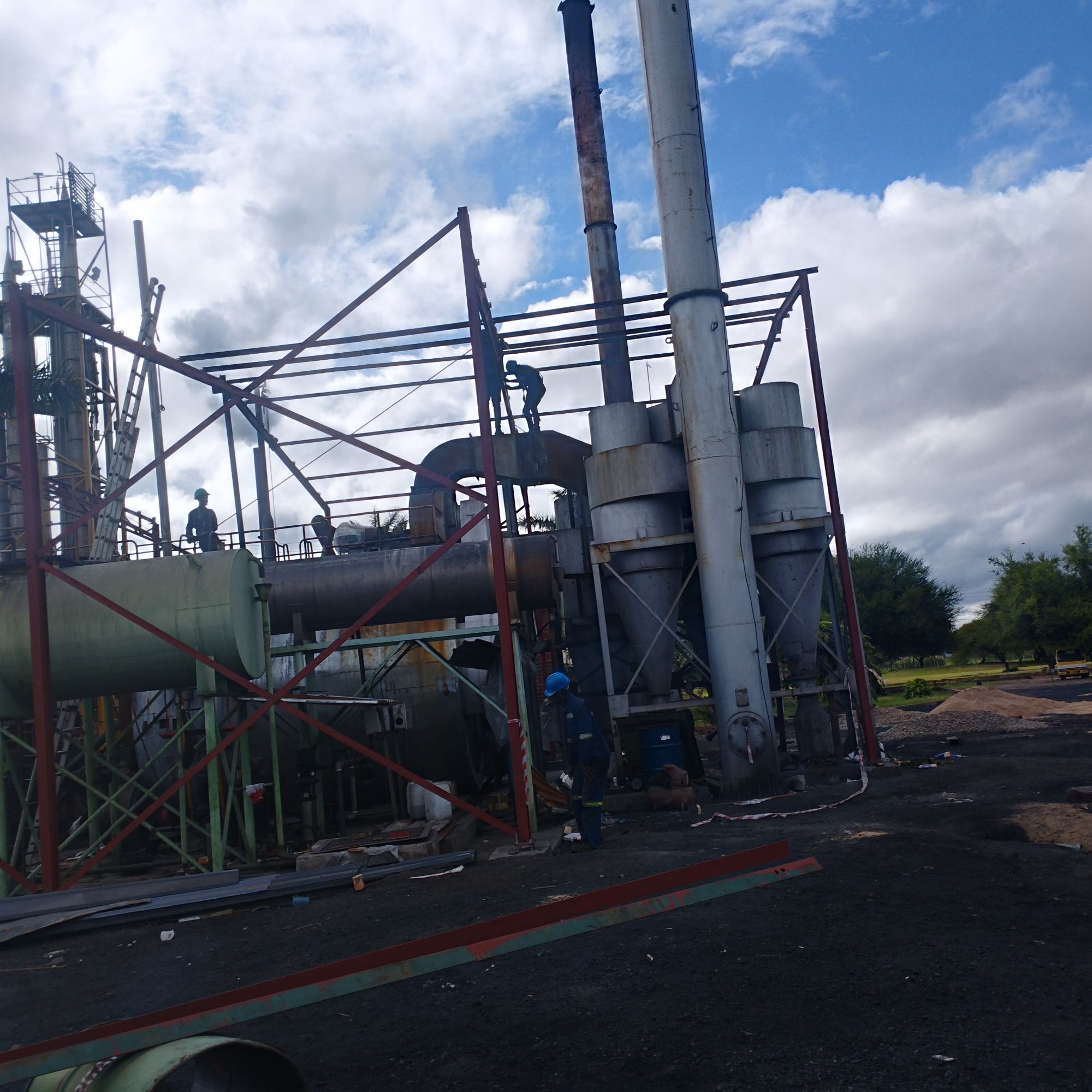 Industrial processing equipment and structural steelwork on-site.